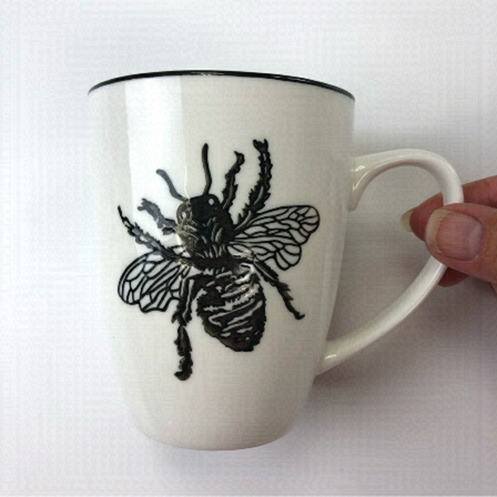 Abbott white ceramic Bee mug